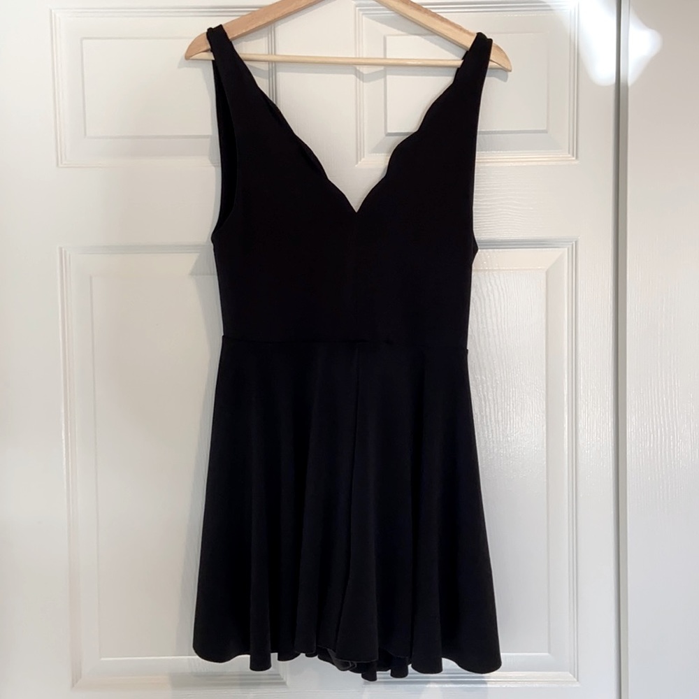 Black scalloped flowy romper